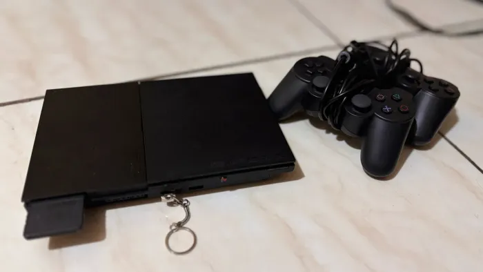 Ps2 seminovo menos de 2 meses de uso