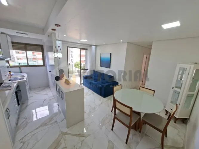 Apartamento com 2 dormitórios para alugar, 60 m² por R$ 3.500,00/mês - Martim de Sá - Cara