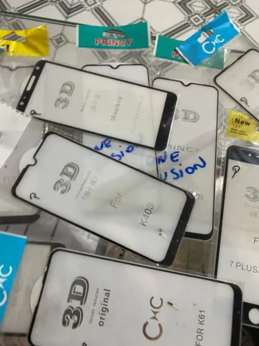 LOTE COM 30 PELÍCULAS DE VIDRO VARIADAS ?