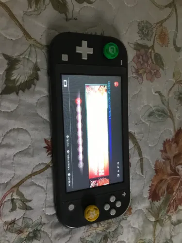 Nintendo switch lite desbloqueado e com jogos no cartão de memória 