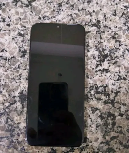 Celular todo bom com carregador! 