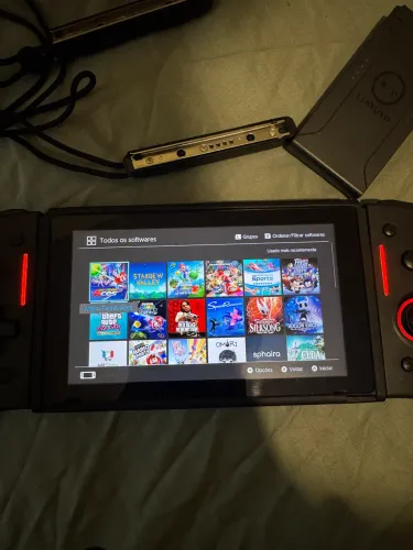 Nintendo switch desbloqueado 256gb, com diversos acessórios 
