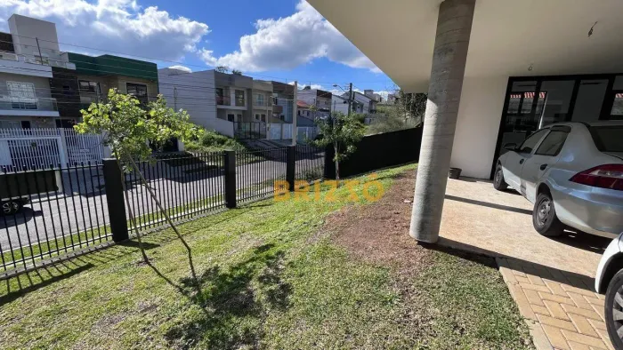 Sobrado com amplo terraço e 3 suítes à venda, 155 m² por R$ 1.090.000 - Pilarzinho - Curit