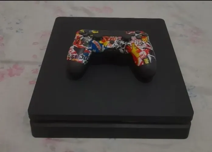 PS4 SLIM + 7 JOGOS MÍDIA FÍSICA