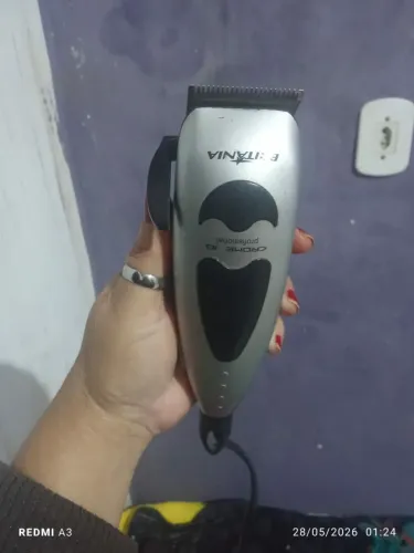 Máquina de cortar cabelo.