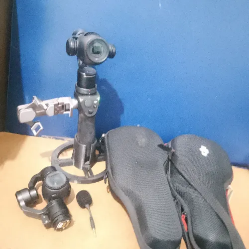 Kit DJI Osmo plus+ e outra Osmo 2eixos ou seja 2x1.inclus acessórios