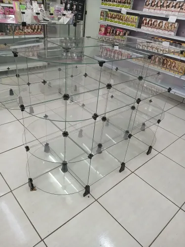 Gôndola central de vidro