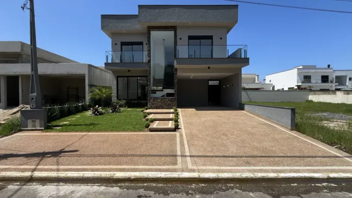 Casa com 4 dormitórios à venda, 221 m² por R$ 1.850.000,00 - Bougainvillee IV - Peruíbe/SP