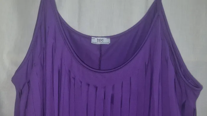Vestido roxo franjado de malha plus size