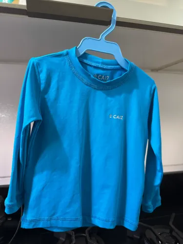 Blusa UV azul infantil 1 ano nova