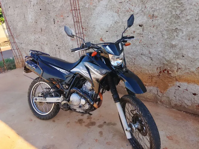 Lander top peneu traseiro zero dianteiro meia vida