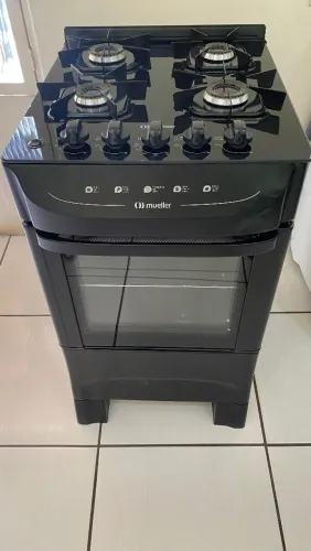 Fogão Mueller preto fosco 4 Bocas. Pequenas avarias estéticas