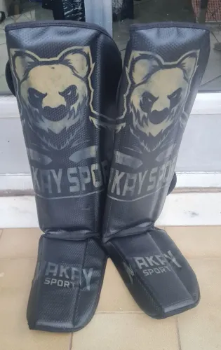 Caneleira Muay Thai Masculina + Bolsa respirável