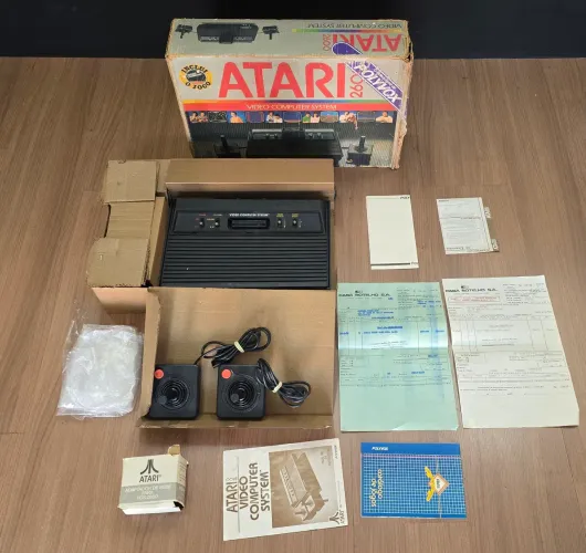 Atari C/ caixa e berço ' Leia o Anúncio