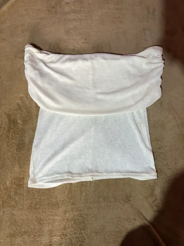 Blusas e macacão