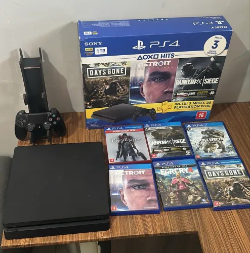 Na caixa , Ps4 1 tera 02 controle original 06 jogos