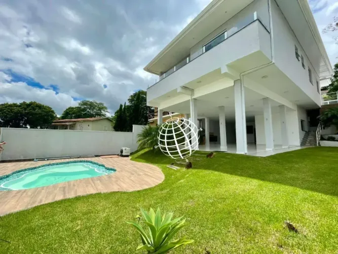 Casa com 3 dormitórios para alugar, 280 m² por R$ 11.008,00/mês - Condomínio Arco Iris - A