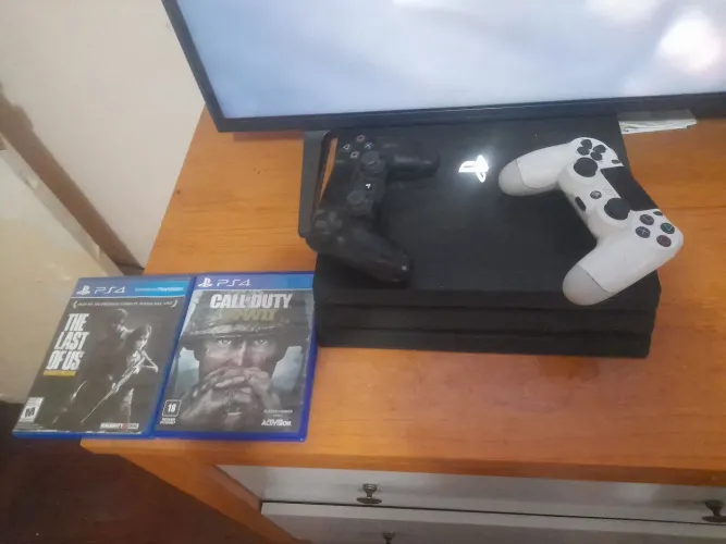 Playstation 4 por 2 jogos e 2. Manete