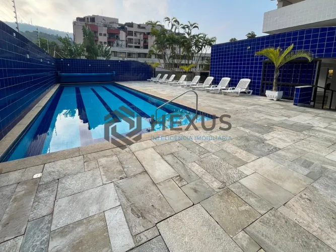 Apartamento beira mar com varanda e lazer de clube na Praia da Enseada, Guaruja