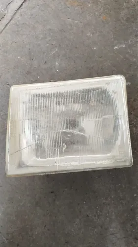 Farol cibie esquerdo Uno frente Alta 