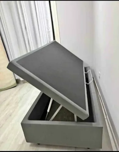Cama box baú cinza com amplo espaço interno