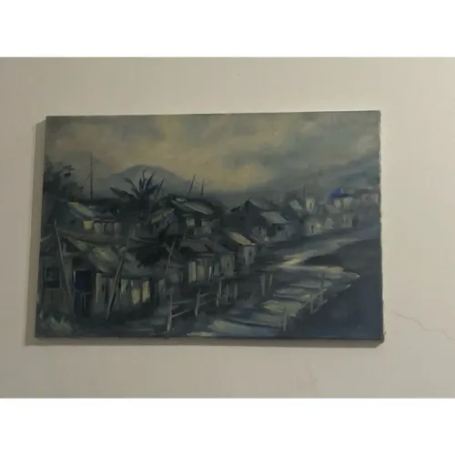 Quadro com cena de casas pintado a mão.