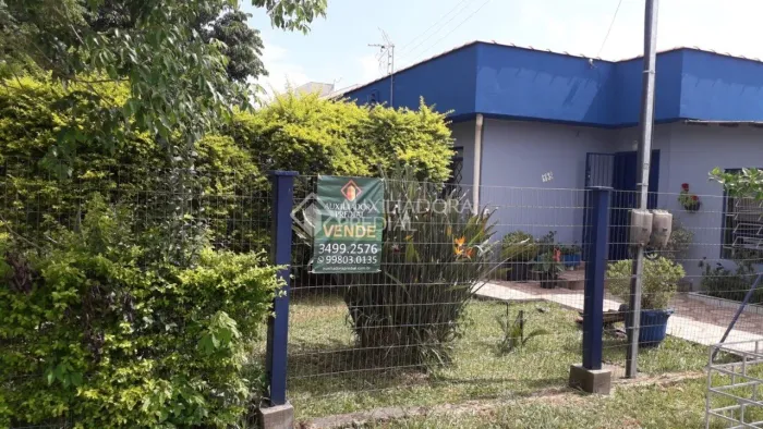 Terreno no Centro do município com duas casas