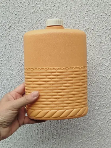 Antiga garrafa de água em plástico anos 70 da troll