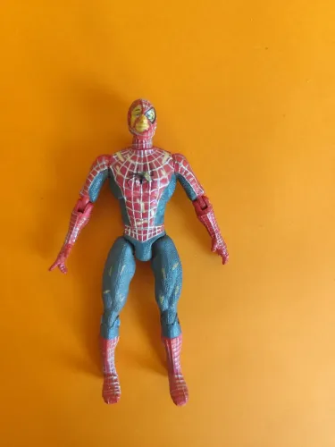 Boneco bomem aranha e quadrinho