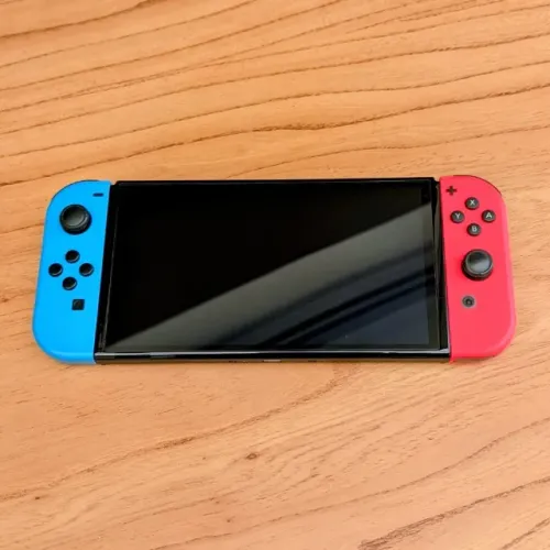 Nintendo Switch OLED Neon Completo Na Caixa + Pro Controller Oficial + Case Transporte