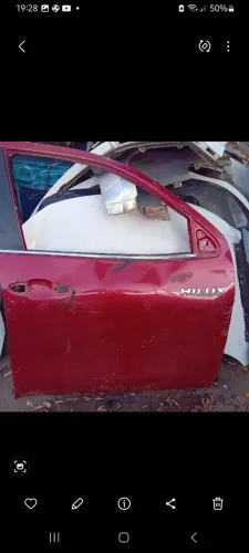 Porta hilux amassada