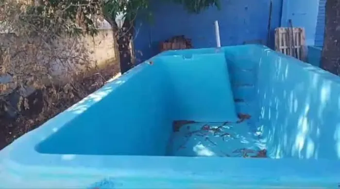 Piscina de fibra usada