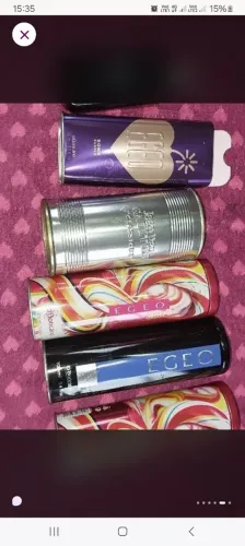 Latas vazia de perfumes egeo e Jean pal