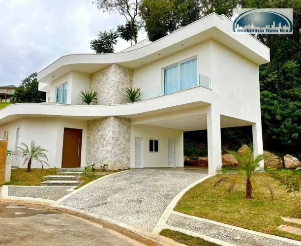 Casa com 4 dormitórios à venda, 300 m² por R$ 2.500.000,00 - Condomínio Reserva do Itamara