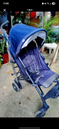 Carrinho de bb ,está pouco desbotado e como está na foto.