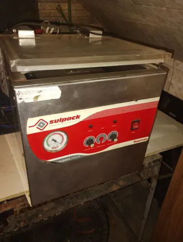 Máquina de embalar a vaco.
