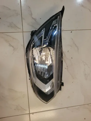 Farol direito onix 20/25
