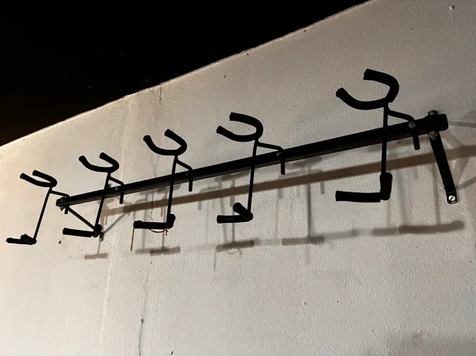 Suporte de parede para instrumentos de corda