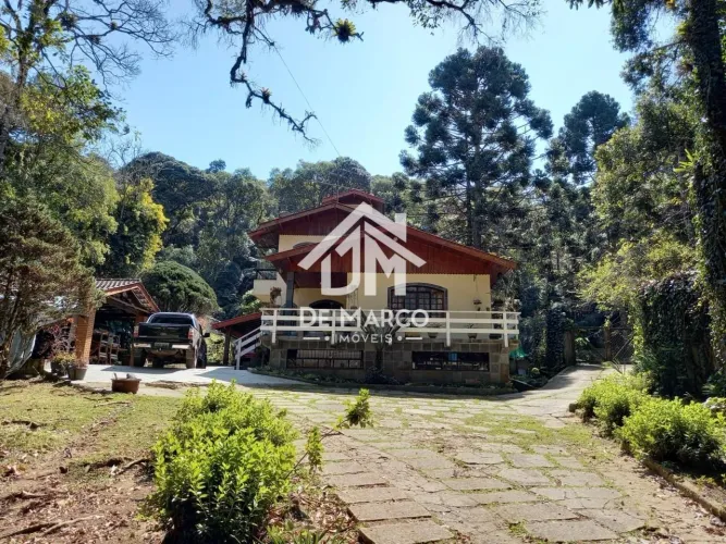 Casa com 3 dormitórios à venda, 239 m² por R$ 1.150.000,00 - Vila Natal - Campos do Jordão