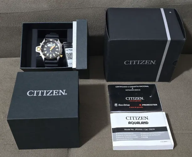 RELÓGIO CITIZEN AQUALAND RELANÇAMENTO JP2004 SÉRIE OURO ZERADO, NA CAIXA COM MANUAIS 