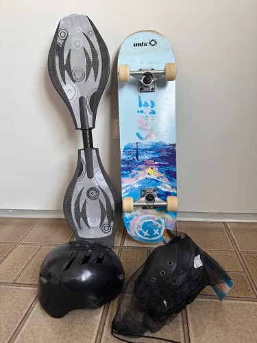 Dois Skates + equipamentos de proteção