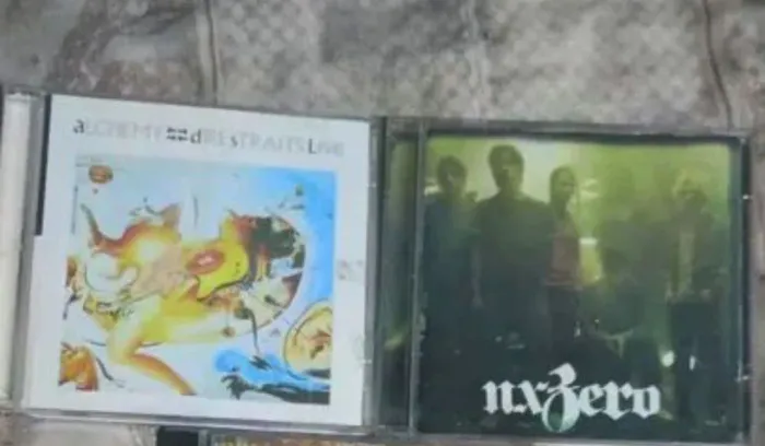 2 CDs de música - Dire Straits e NxZero