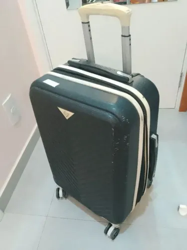 mala de viagem polo king com rodinhas, puxador está enroscando. padrão anac