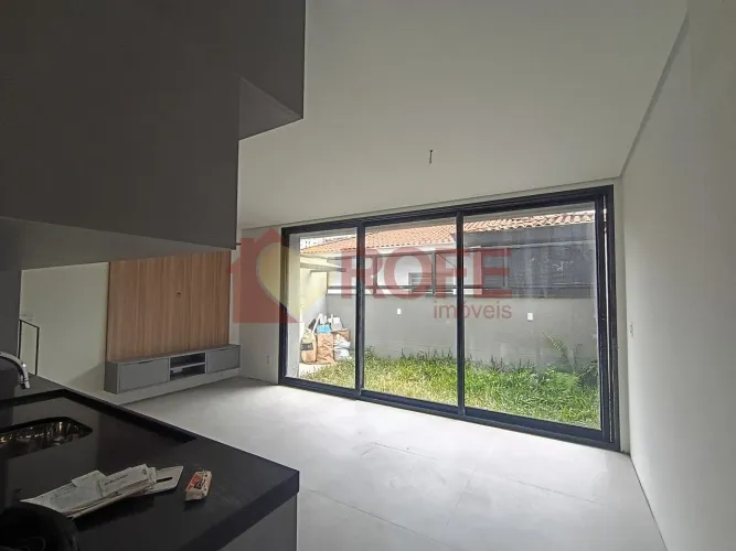 Casa em condomínio Vila Olimpia, 100m² úteis, 2 suítes, 2 vagas, quintal, e Roof Top priva