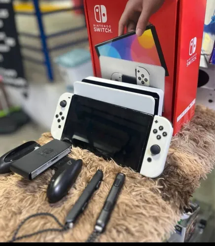 Nintendo switch oled 64g mais SD 128gb