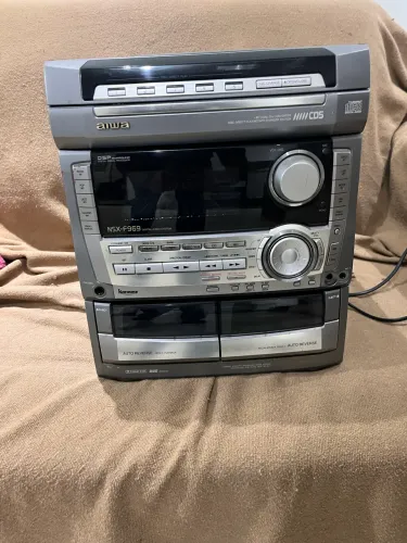Som Aiwa com defeito no botão de volume