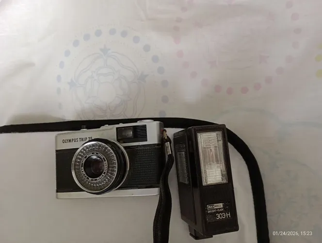 Câmera olimpus trip 35 com Dayligth Flash adaptável