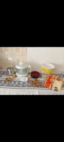 Kit cozinha espremedor laranja 127v, balde pipoca,avental,xícaras etc