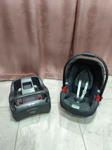 Bebê Conforto Burigotto Touring Evolution + Base para Carro.