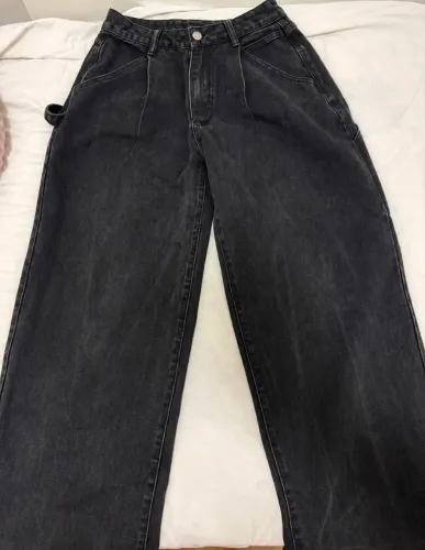 Calça jeans preta larga cintura média a baixa